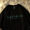 A black loose-fit cotton short sleeve t-shirt with a letter pattern, shown flat.