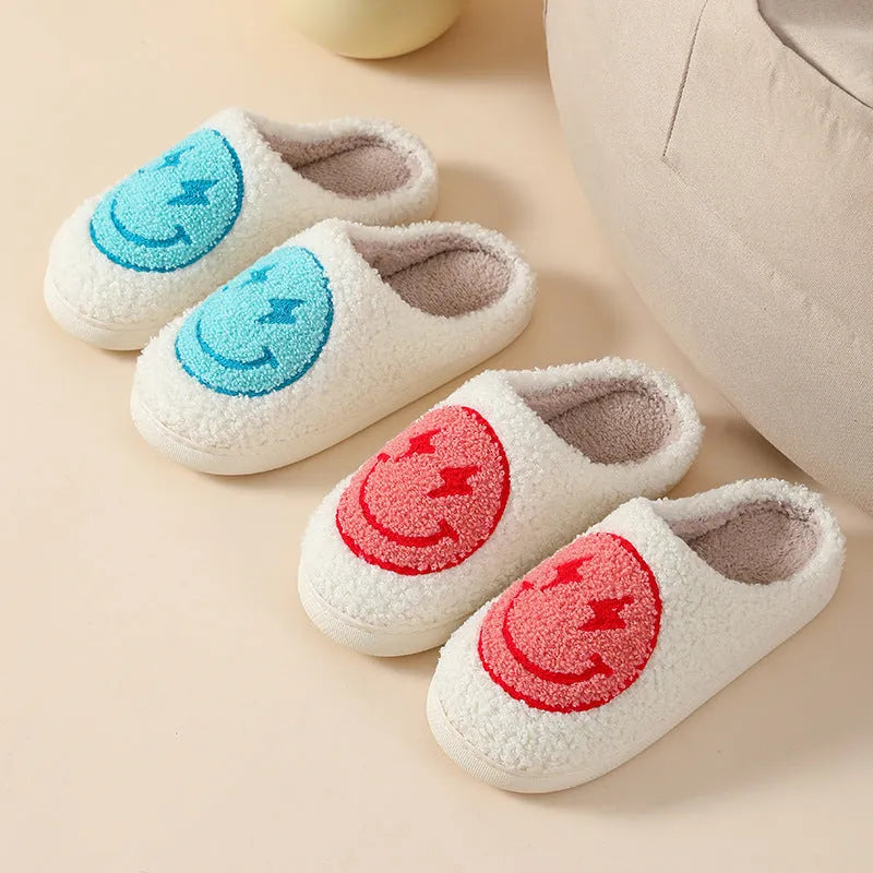 Adult women's plush cartoon-style home slippers with non-slip PVC soles in multiple colour options.