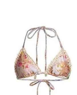 Women's creamy-white floral bikini set with matching skirt in nylon fabric