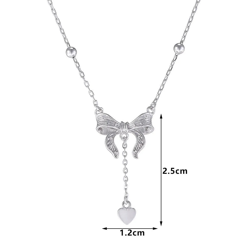 S925 pure silver butterfly and heart-shaped pendant on a silver O-ring clavicle chain.