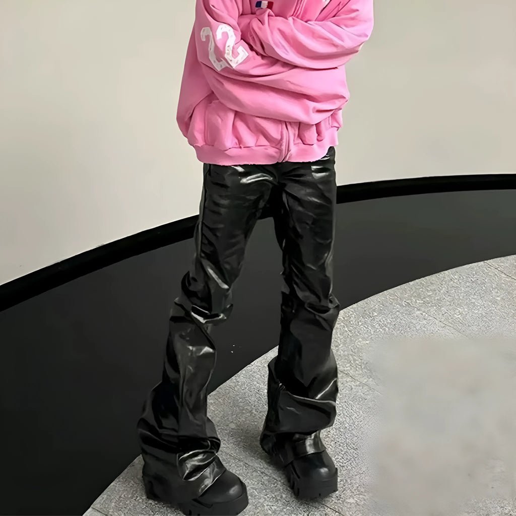 Black coated patent leather straight-leg skinny jeans on a model