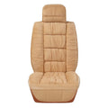 Short plush car seat cushion cover in beige colour on a vehicle seat
