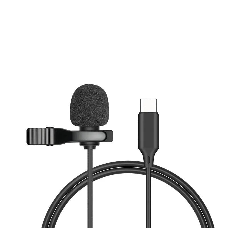 Wired lavalier clip microphone with in-ear monitor headphones and multiple plug options on a white background.