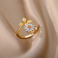 Gold and platinum electroplated copper rotatable ring with adjustable open mouth and geometric round shape