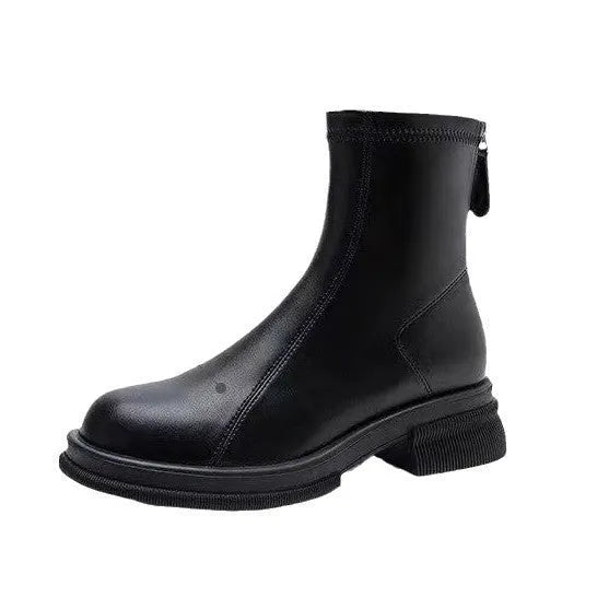 Women's black ankle boots with a flat heel, round toe, and a back zipper.