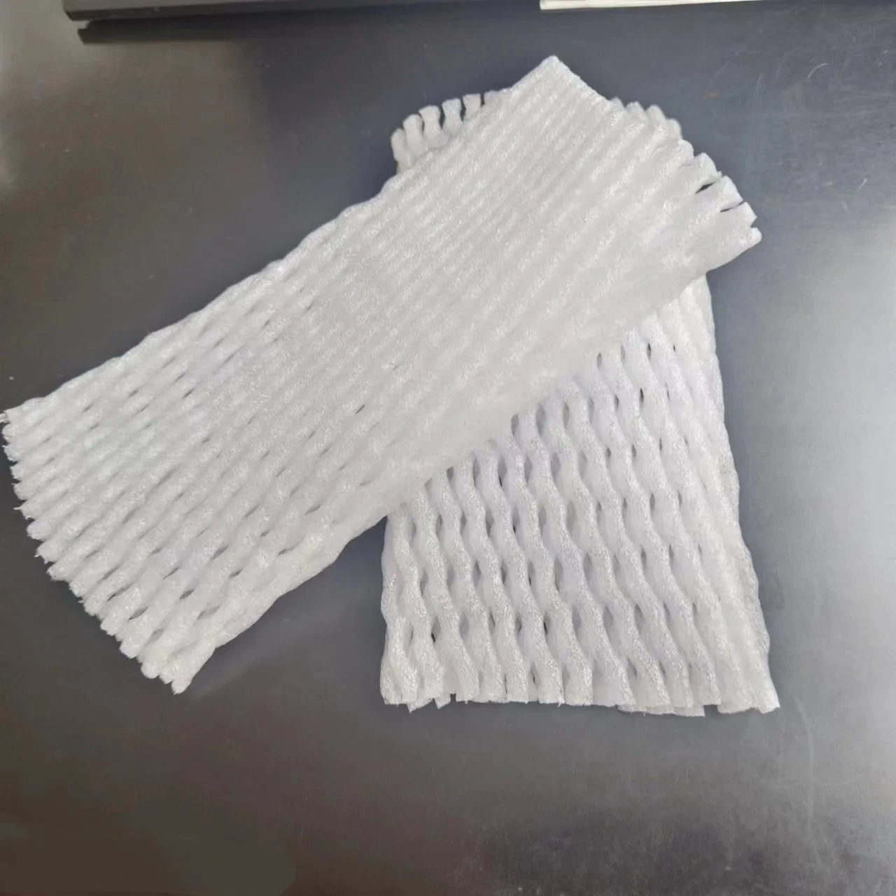 White foam fruit net cover shockproof protective case shown in multiple sizes for delicate fruit transport
