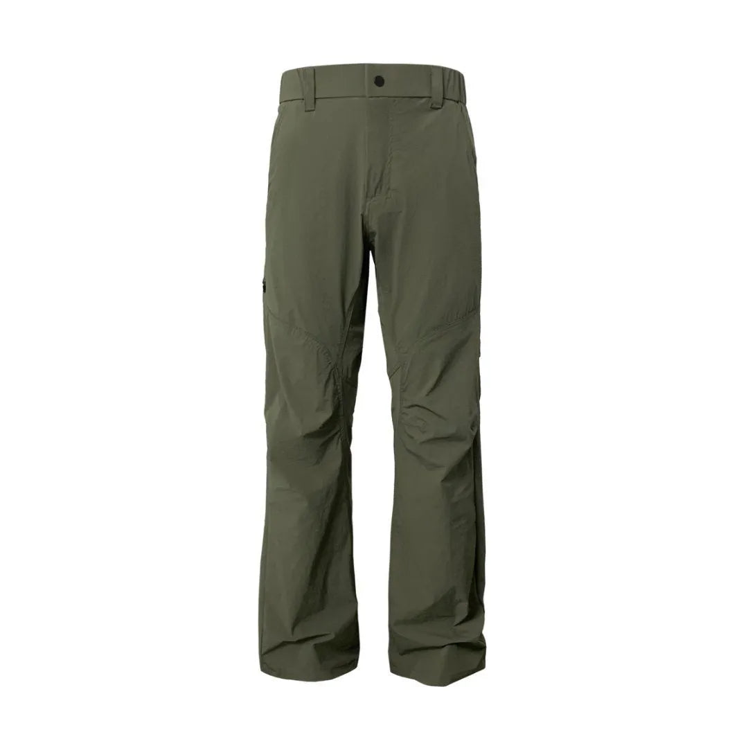 Man wearing grey 3D cut deconstructed casual trousers with a straight leg and elasticated waist.