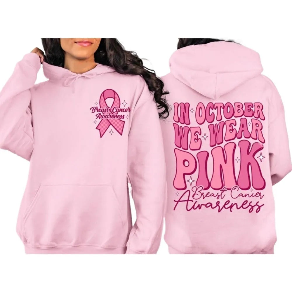 Breast cancer awareness pullover hoodie in pink with retro art design and a side seam pocket.