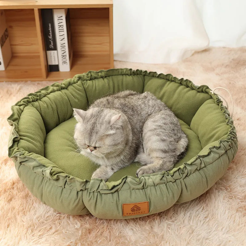 Grey and green reversible donut pet bed shown in small, medium, and large sizes for cats and small dogs