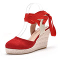 Women's apricot wedge sandals with buckle strap, beaded detail, and a round toe.