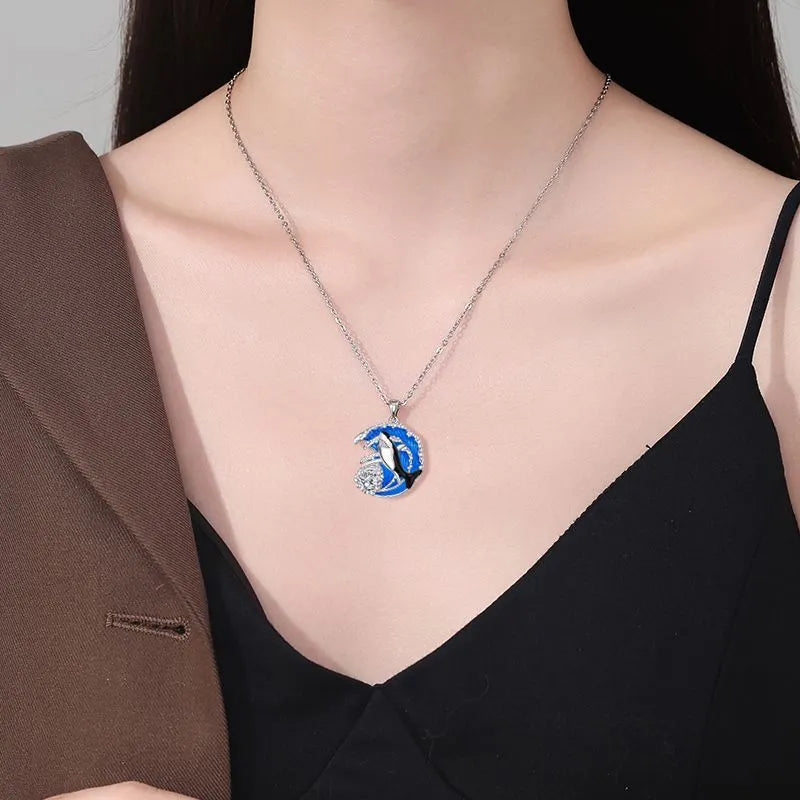 HAILANG women's silver-tone shark pendant necklace on an adjustable cross chain.