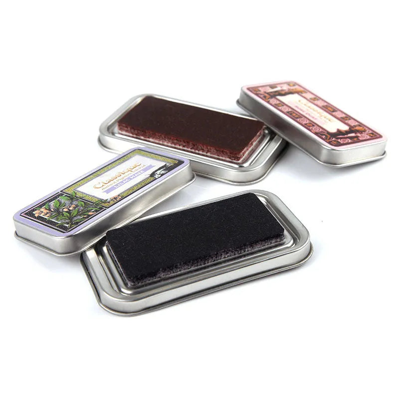 Rectangular oily ink pad for rubber stamps in five colour options measuring 0.3 x 5.7 x 1.7 cm
