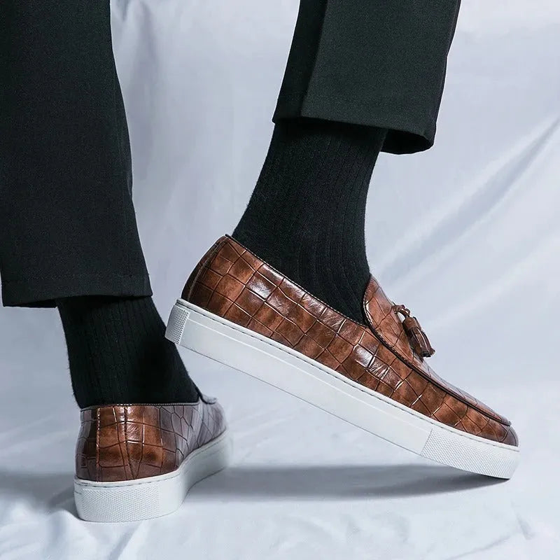 Men's black tassel slip-on casual sneakers with round toe and rubber sole