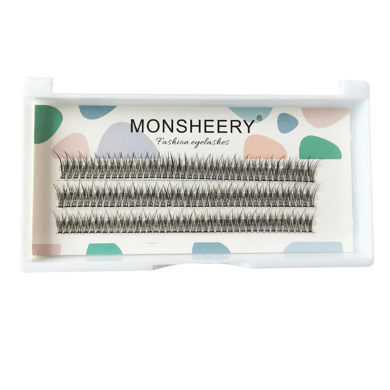 Black V-shaped fishtail false eyelashes on a white background showing graduated length design.