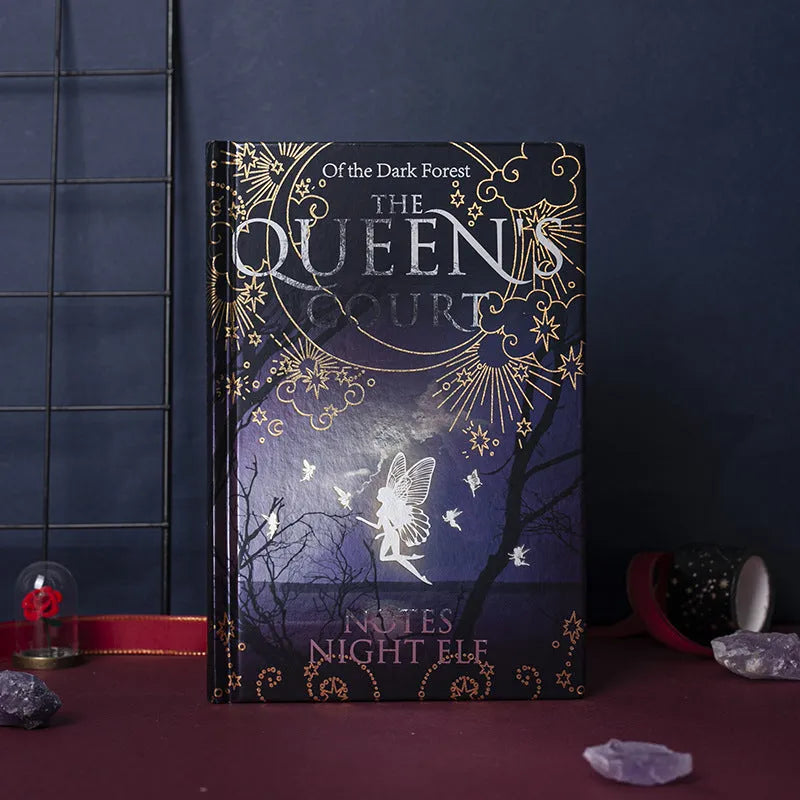 Blue A5 hardcover luminous notebook with retro night elves illustrations open to show full-colour interior pages