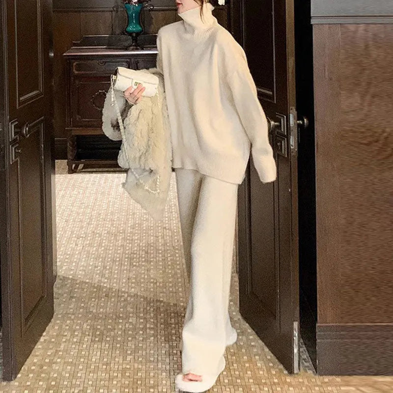 Women's casual acrylic fibre sweater and wide leg pants two-piece set in a solid colour.