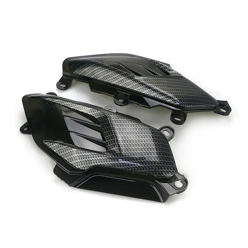 Pair of carbon fibre decorative LED side lamps for Yamaha NMAX125 and NMAX155 scooters.