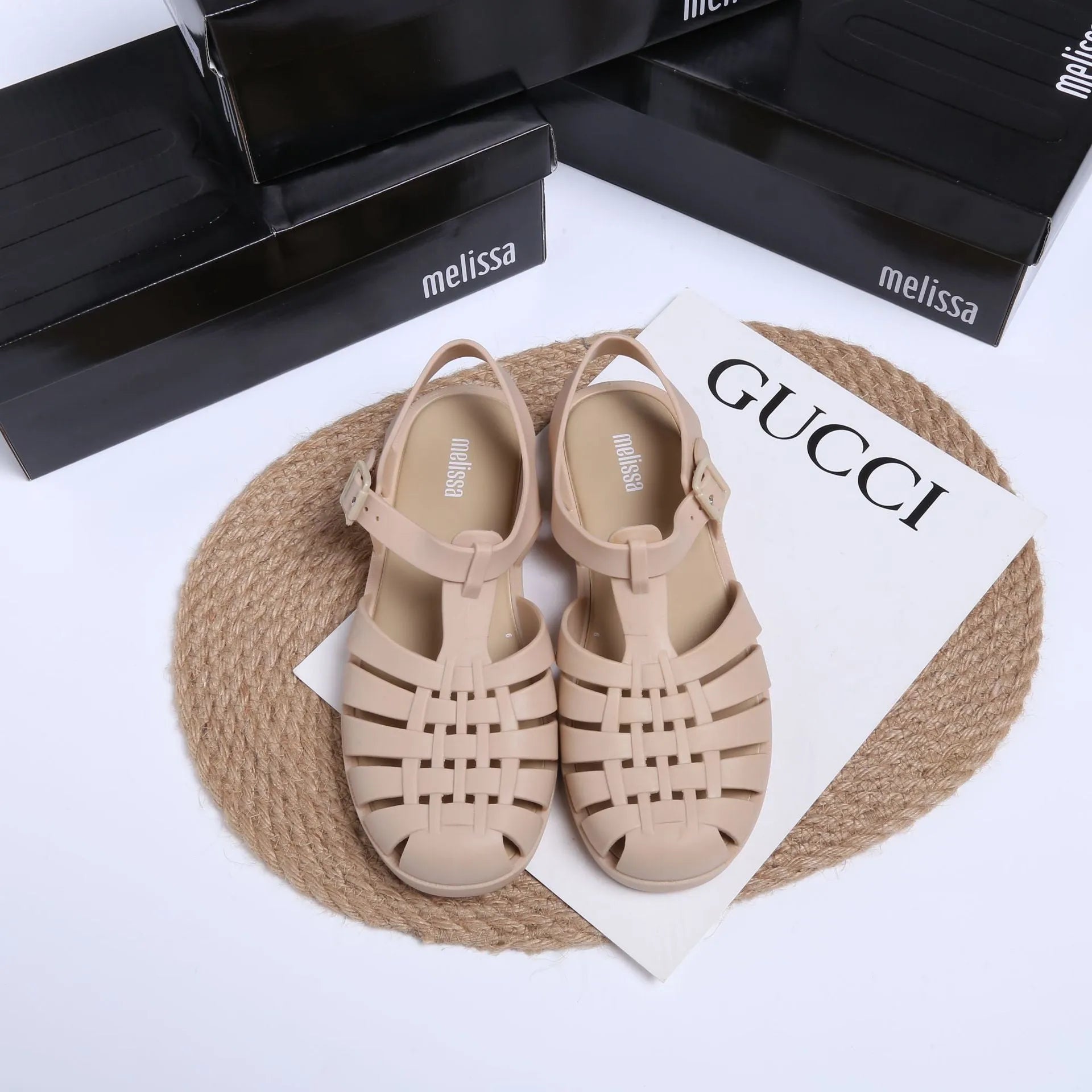 Vintage weave Roman sandals with a buckle strap and hollow-out design in matte black.