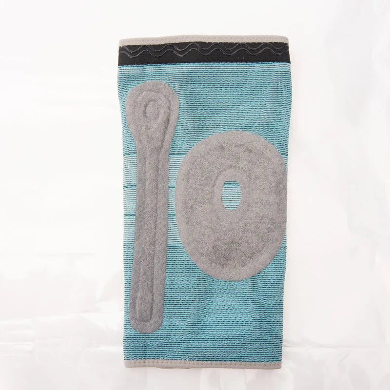 Sky blue silicone knee pad for basketball and sports on a knee.