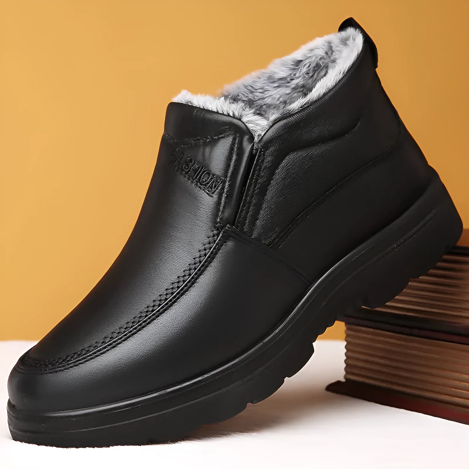 Men's black winter slip-on shoes with fleece lining and a textured non-slip rubber sole.