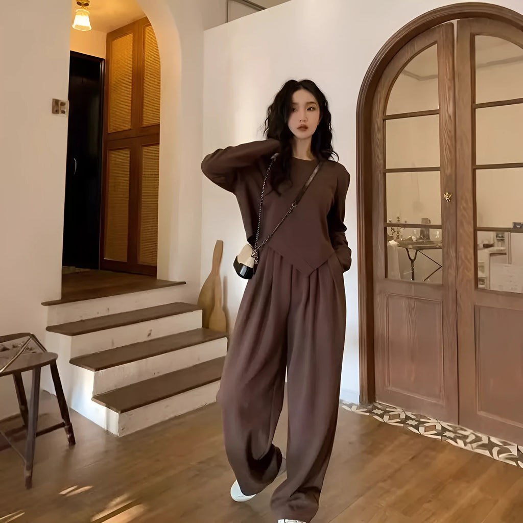 Women's casual sports suit set showing khaki coloured top and trousers with loose fit design