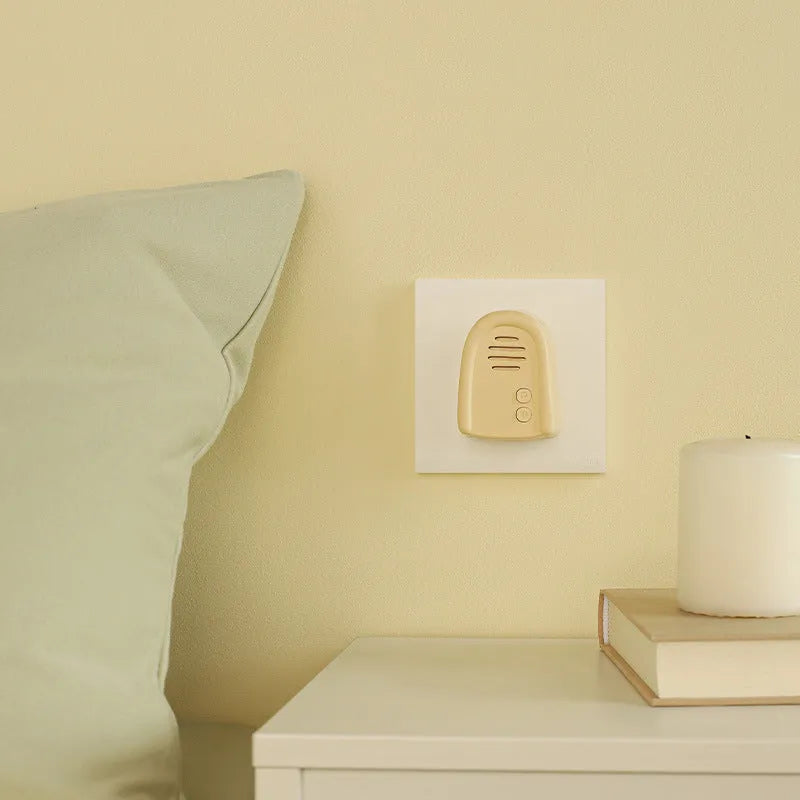 Wireless plug-in doorbell with chime receiver in milky yellow and white colour options