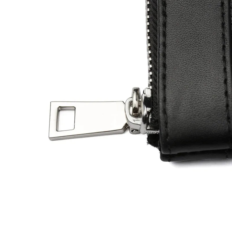Men's black cowhide leather clutch wallet with plaid top, shown closed, measuring 20cm by 10cm