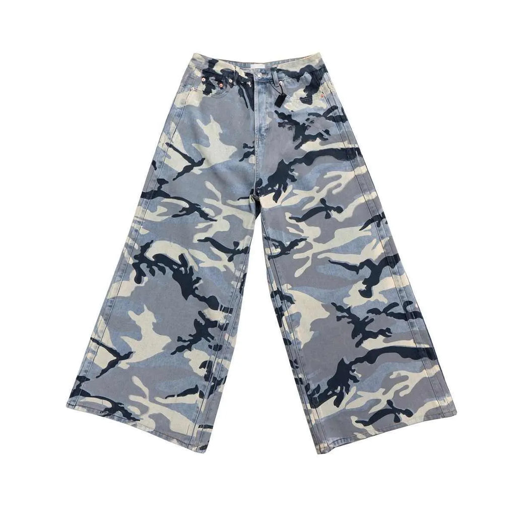 Snow camouflage blue loose-fit denim jeans on a mid-waist mannequin, showing the trousers length and camouflage pattern.