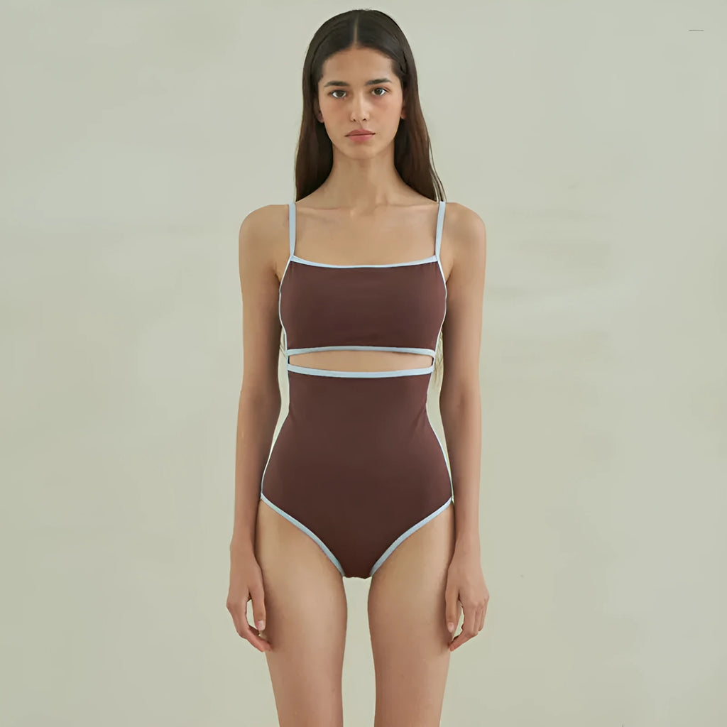 Brown women's one-piece swimsuit with triangle neckline design on mannequin