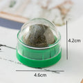 A plastic catnip chew ball toy for dental cleaning, shown in assorted colours including pink, blue, and green.