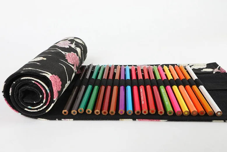 Canvas roll-up pencil case with ballet girl print, shown unrolled to display multiple pencil loops.