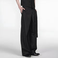 Black straight-leg women's trousers with a front pleat and adjustable waistband on a hanger.