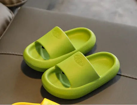 Children's EVA slippers in bright colours with non-slip soles showing size range options