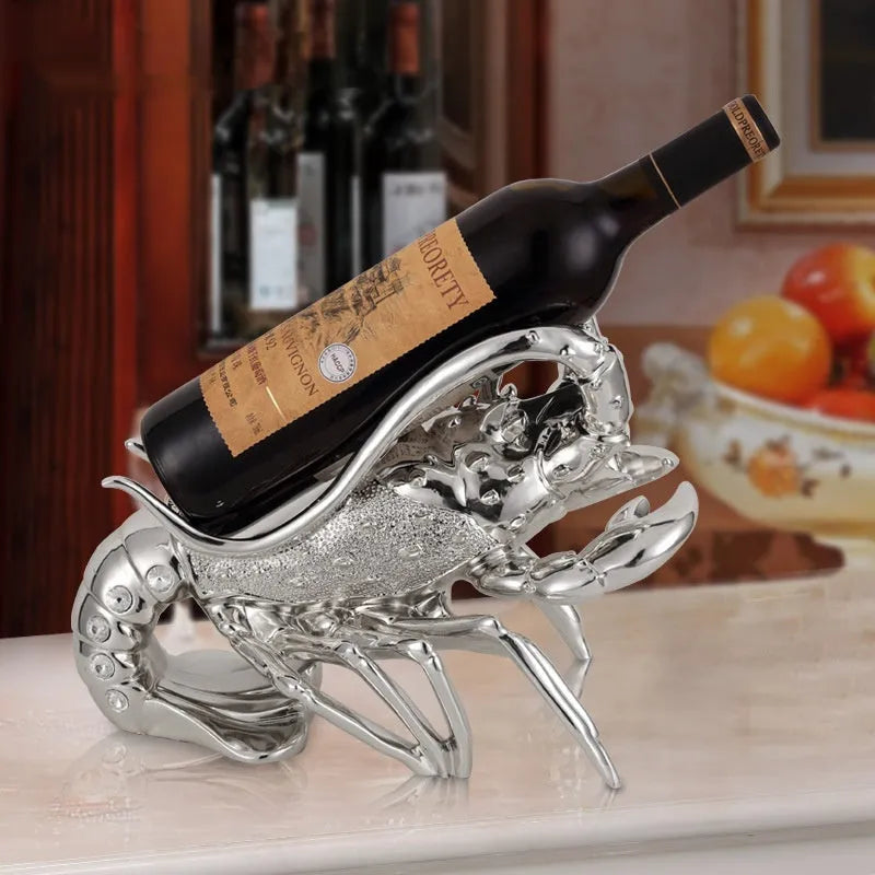 Lobster wine rack ornament in metallic finish displaying bottles