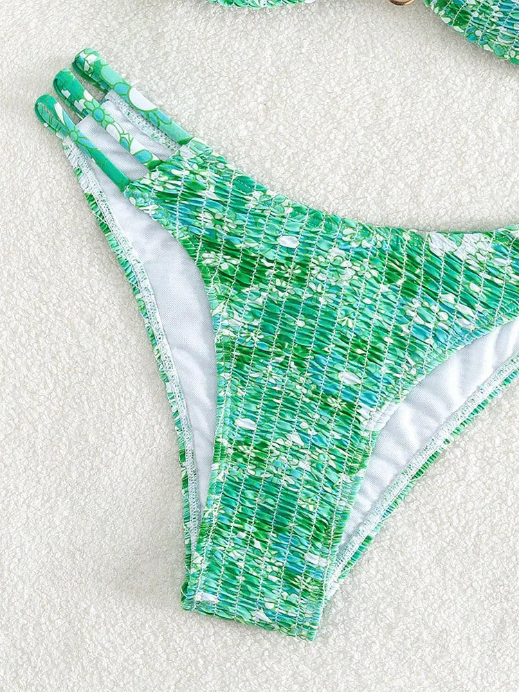 Women's floral print bikini swimsuit in high-waisted brief style.