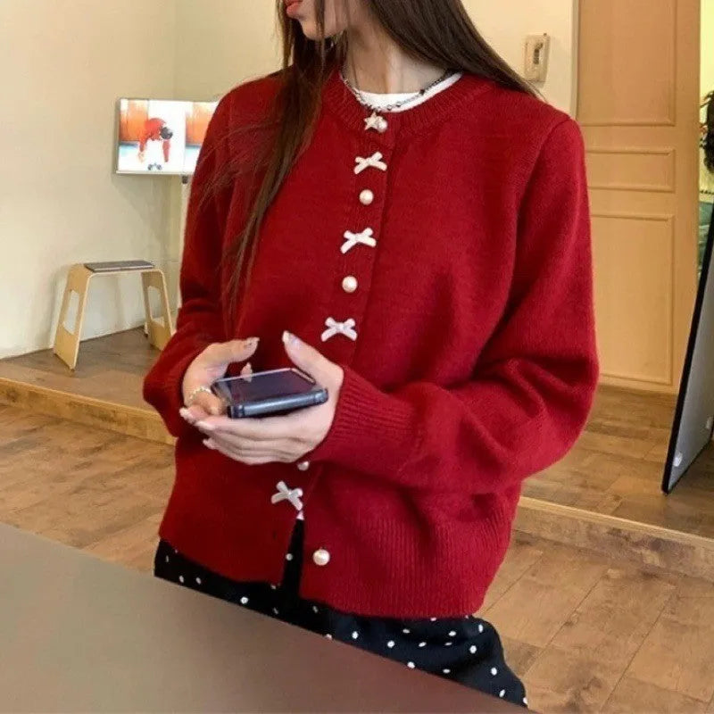 Women's bow detail pearl button cashmere blend cardigan sweater in regular fit