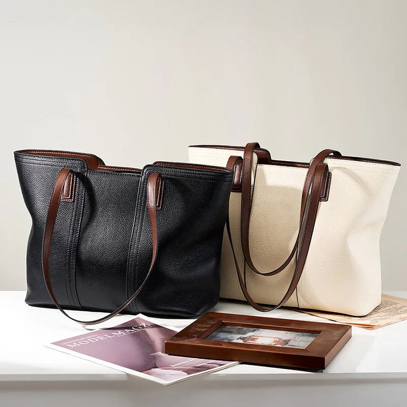 Women's genuine leather crossbody commuter bag with multiple interior compartments in horizontal square design