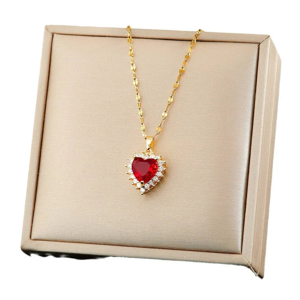 Gold red heart and flower pendant necklace with matching ear studs and ring, made from titanium steel.