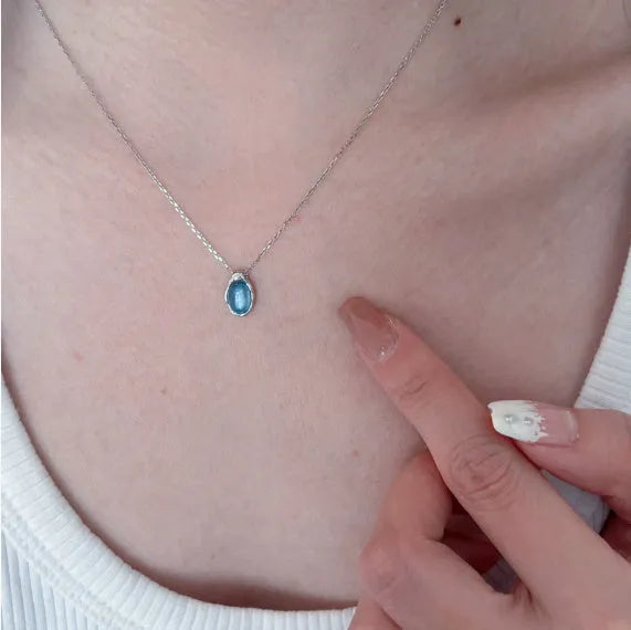 Navy blue geometric water drop necklace with adjustable chain and cross chain design