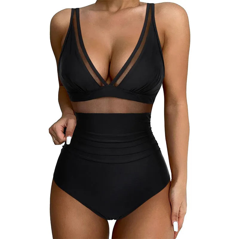 Black women's one-piece halter swimsuit with mesh detailing and brief-style bottom.