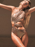 Gold backless one-piece women's swimsuit on hanger showing solid colour and sleeveless design