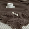 Four-layer gauze cotton blanket with tassel fringe in avocado green colour