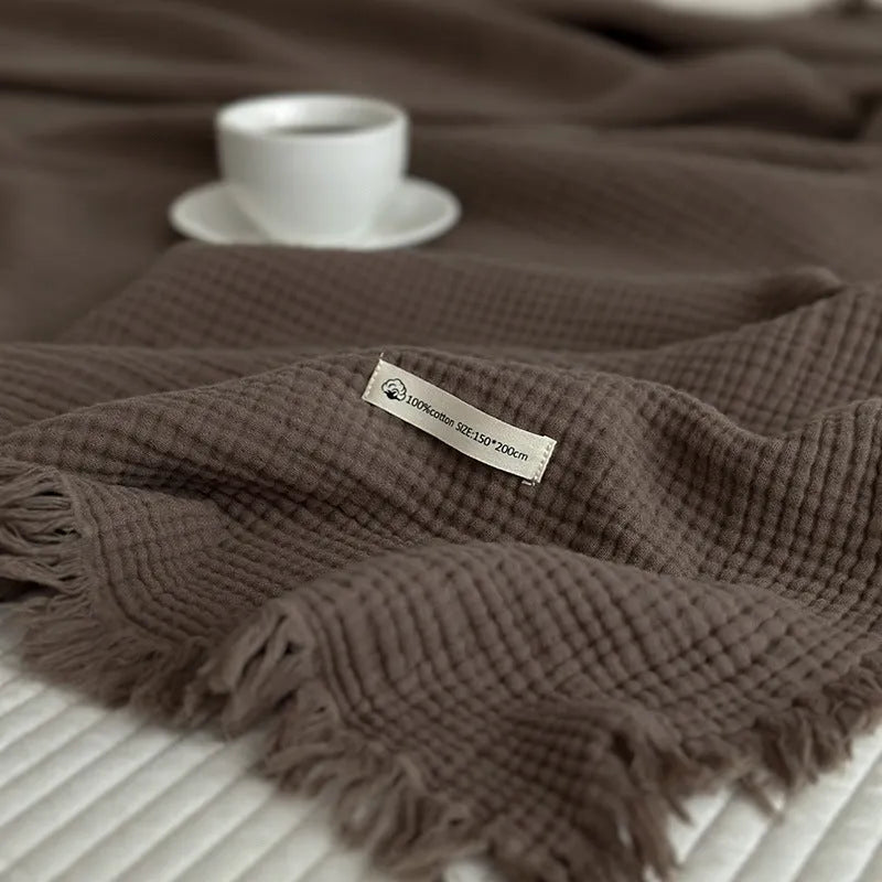Four-layer gauze cotton blanket with tassel fringe in avocado green colour