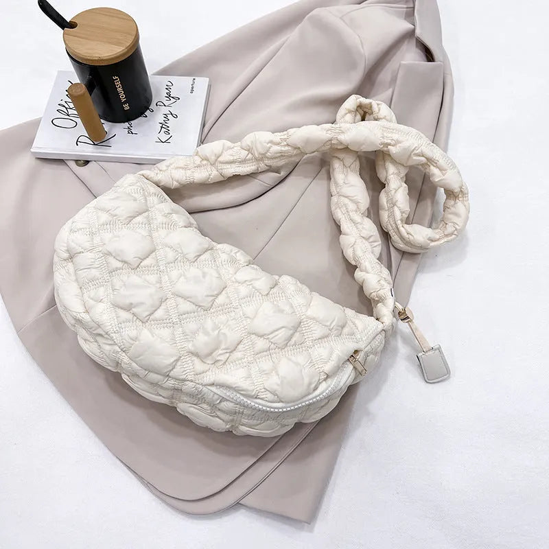 Women's light beige nylon messenger bag with long shoulder strap, shown with dimensions 35cm wide by 20cm high.