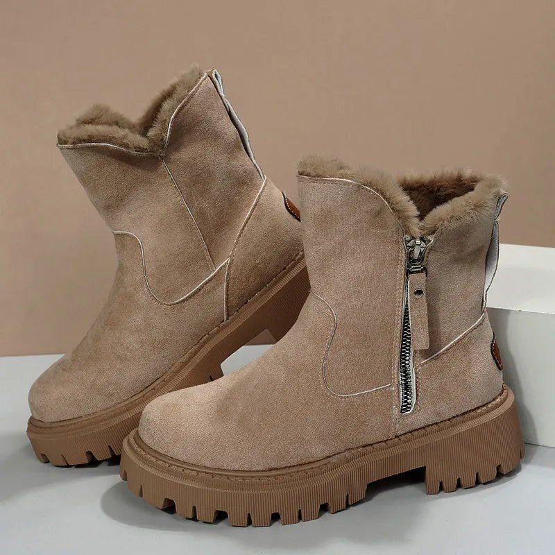Women's black high-top faux suede snow boot with side zipper and non-slip sole.