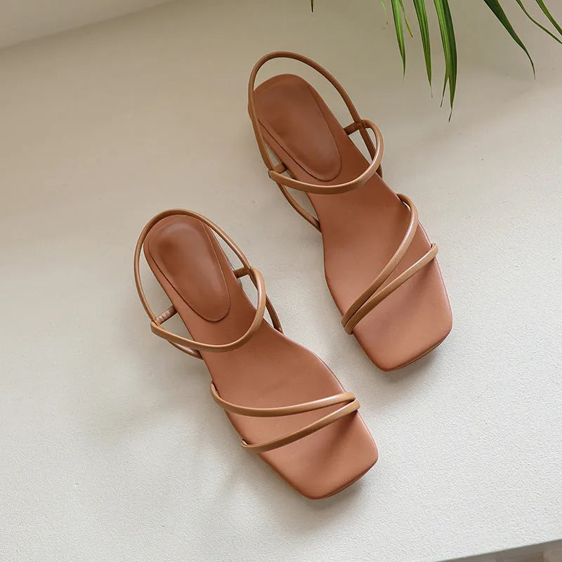 Women's flat strap Roman sandals with square toe in microfiber, shown in green colour