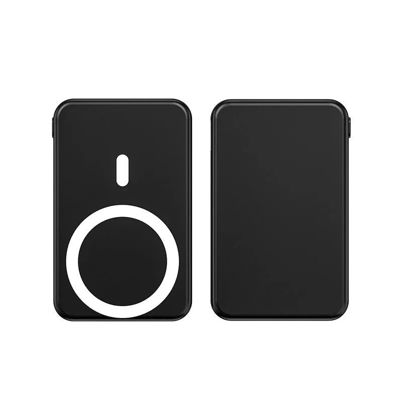 Silver magnetic wireless charging power bank with folding stand unfolded, shown next to a smartphone.