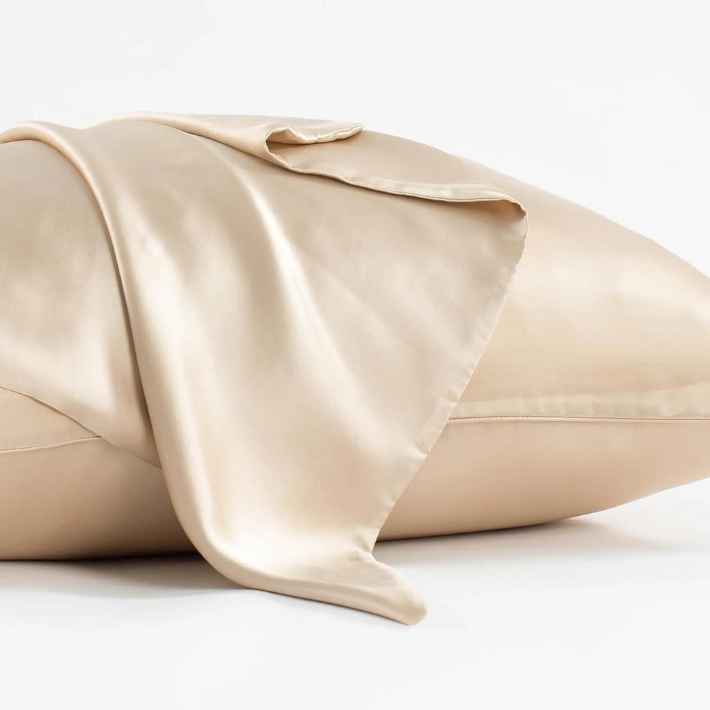 Dark grey envelope-style silk pillowcase laid flat, showing its size and solid colour.