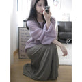 Purple women's blouse with hollow out pattern, princess sleeves, and shoulder strap detail on hanger