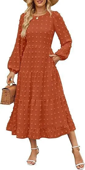 Women's long sleeve autumn dress with ruffle sleeves and high waist in a solid colour.
